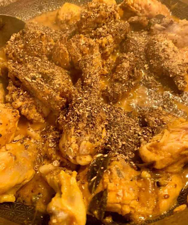 Step 1.1: Add the coarsely ground spices to the wok and mix well