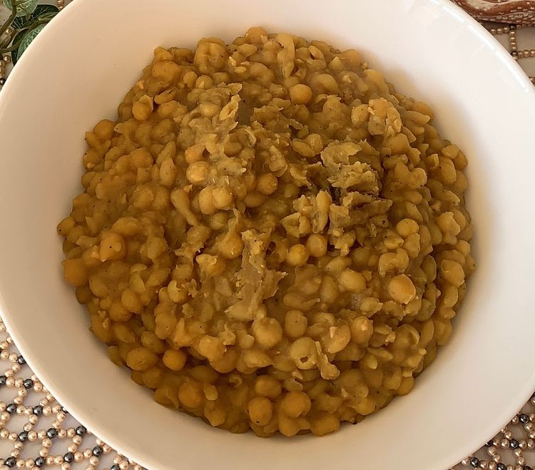 Step 1.1: Allow excess water to evaporate and mash the peas using a masher