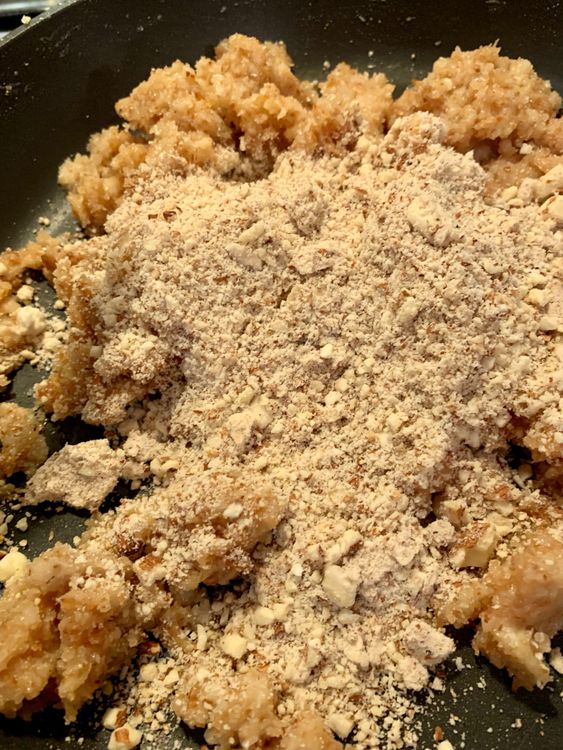 Step 1.1: Add in the coarsely ground nuts and mix them into the mixture