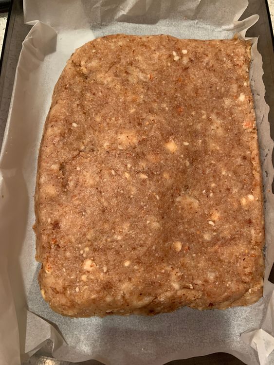 Step 1.1: Flatten the mixture evenly with the help of a spatula and press it down firmly
