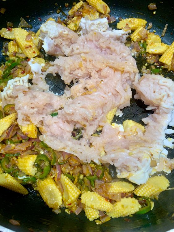 Step 3.1: Push the vegetables to the side of the pan and add the marinated chicken mince
