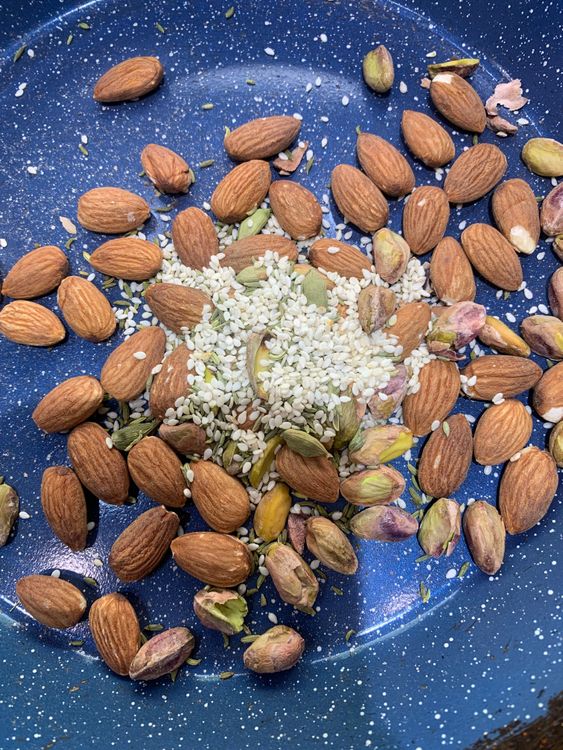 Step 1.1: Dry roast the almonds, pistachios, sesame, and fennel seeds until they release a fragrant aroma