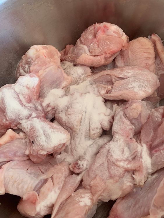 Step 1.1: Add the baking powder and salt to the wings, and toss them to ensure an even coating