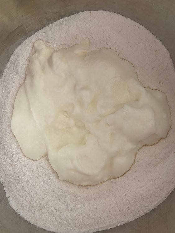 Step 1.1: Add curd to the bowl and mix well until combined