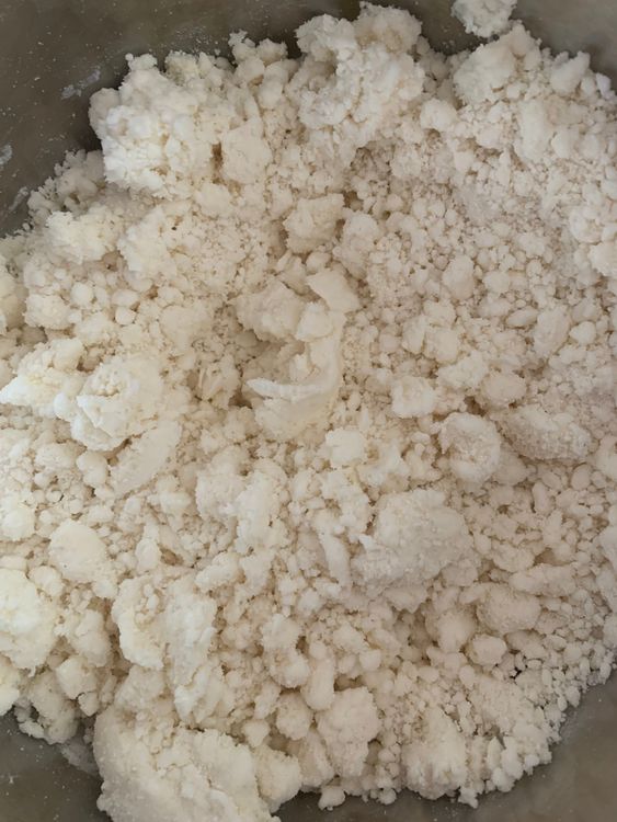 Step 1.2: Add curd to the bowl and mix well until combined