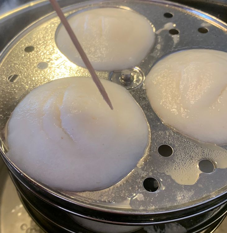 Step 1.2: Place the idli moulds with batter into the pot, and cover it with a lid