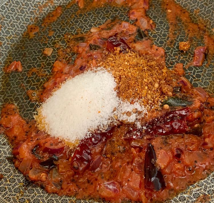 Step 1.1: Add desiccated coconut, sambhar powder and salt to the mixture and mix well