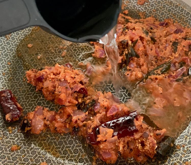 Step 1.1: Next, add water and lemon juice to the mixture, stir and cook for a minute