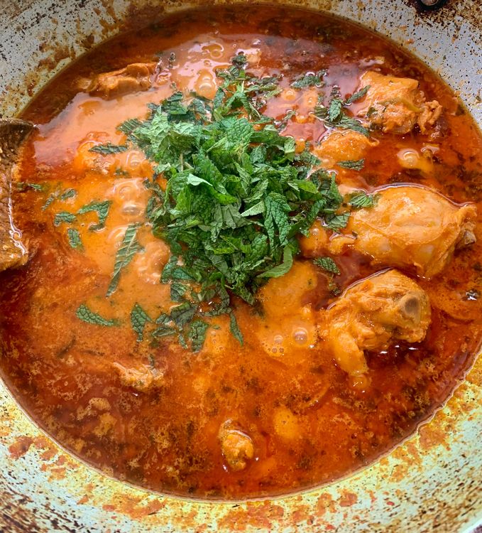 Step 4.1: Once the chicken is cooked, add the chopped mint leaves
