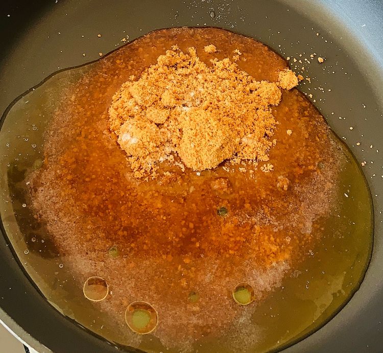 Step 1.1: Combine jaggery powder, rock salt and water in the pan