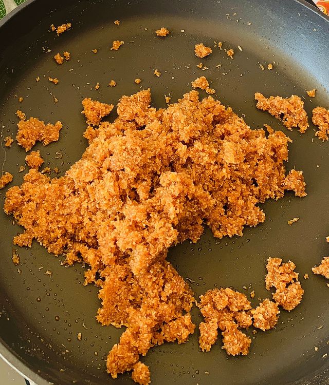 Step 1.3: Add the roasted coconut mixture to the pan