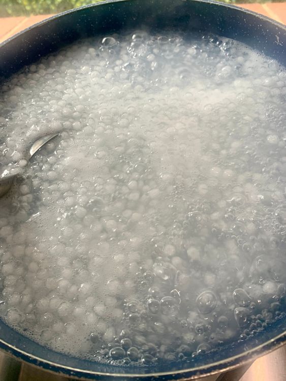 Step 1.1: Add the soaked sabudana to the boiling water and stir continuously to prevent sticking