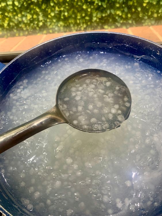 Step 1.1: Cook over medium-high heat until the sabudana turns translucent and the mixture thickens into a gel-like consistency