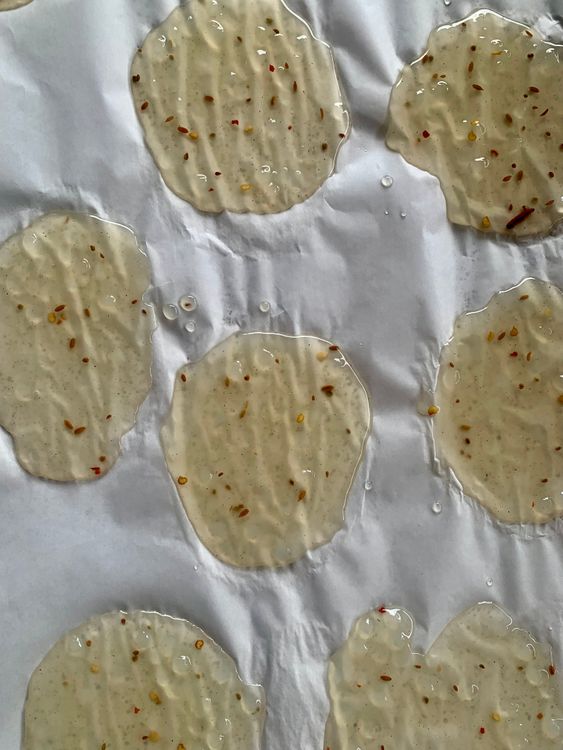 Step 2.1: Place the spread papads under direct sunlight for 7-8 hours or until they are firm and can be peeled off easily