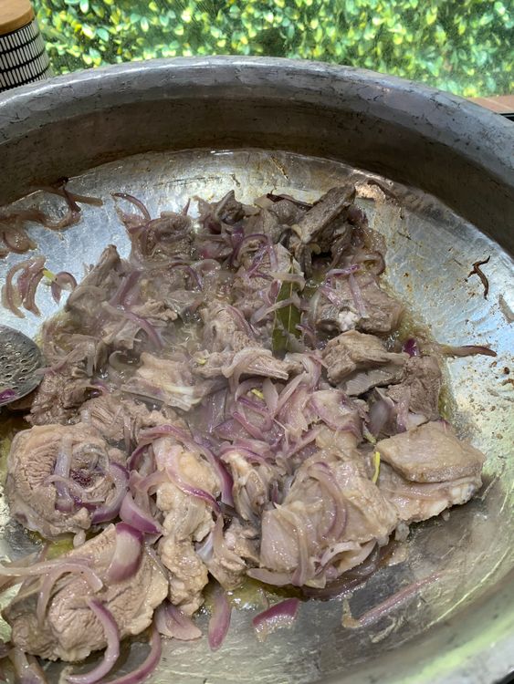 Step 4.1: Add sliced onions and salt, stirring continuously, until the onions turn light brown