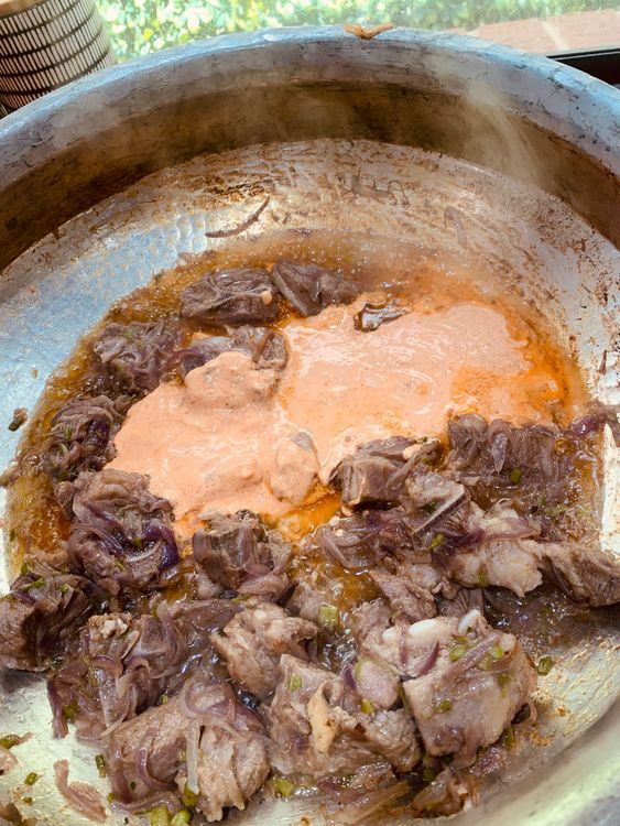 Step 4.1: Add the prepared curd mixture and cook until the oil separates from the mixture