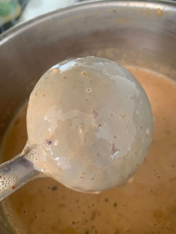 Step 1.2: Cook on low-medium heat, stirring constantly and scraping down the sides until the milk reduces to half and attains a thick consistency