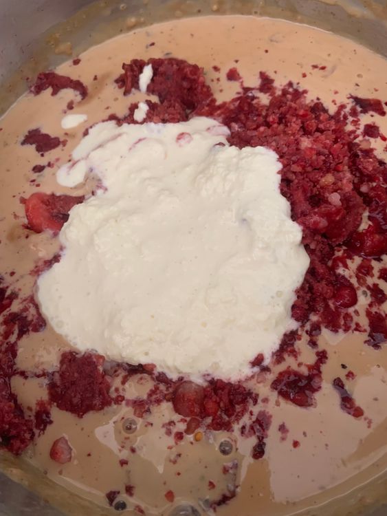 Step 1.2: Once the milk mixture has cooled, pour in the fruit pulp and the cream