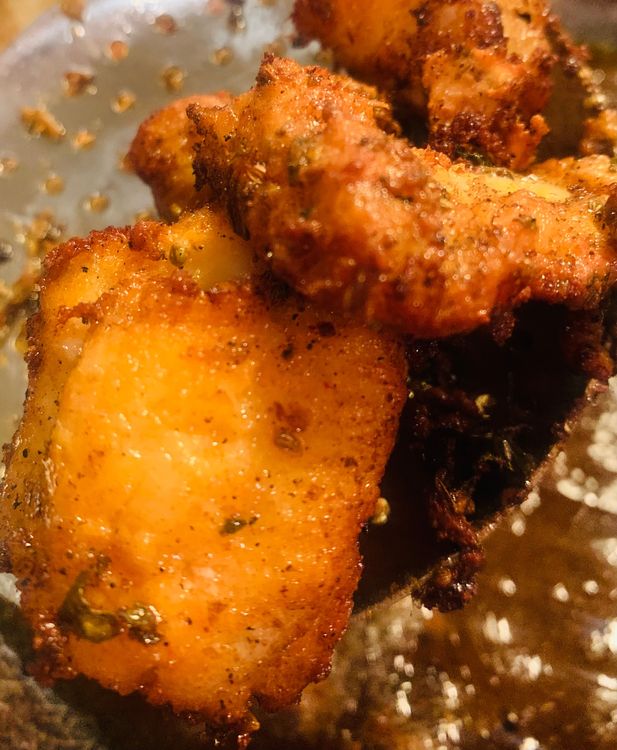 Step 4.1: Just before serving, re-fry the fish in hot oil over medium-high heat for 1-2 minutes to achieve an extra crispy and golden exterior