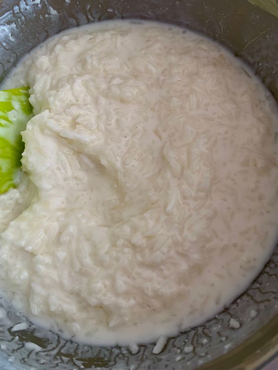 Step 1.1: In a large mixing bowl, combine the cooked rice, desiccated coconut (if using), whisked curd, and salt