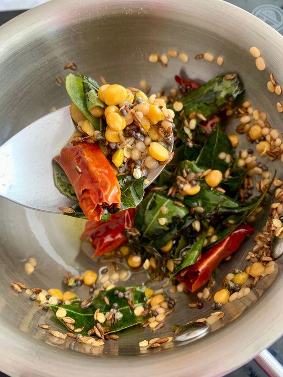 Step 2.1: Add the dry red chillies, green chillies, and curry leaves