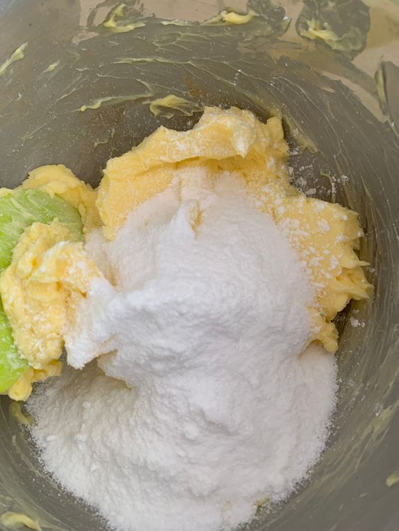 Step 1.1: In a mixing bowl, cream the softened butter and powdered sugar using a hand mixer or whisk until light and fluffy, about 3–5 minutes