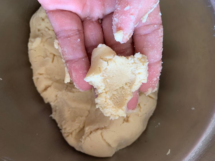 Step 1.2: Gradually add the sifted flour and salt to the butter mixture