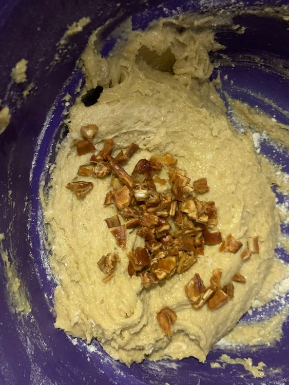Step 1.1: Fold in the chopped dates and ensure they are evenly distributed in the batter