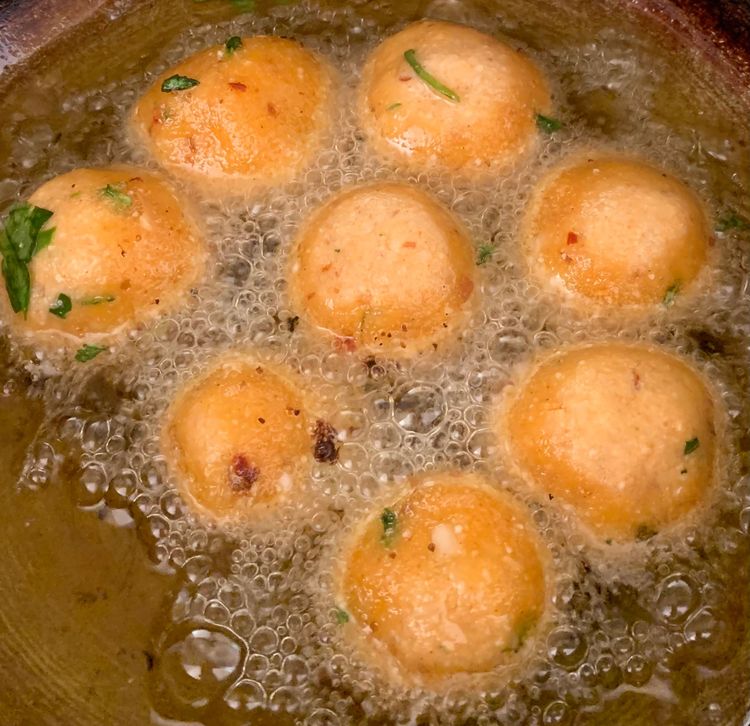 Step 1.1: Place the shaped dough bites into the hot oil in batches, avoid disturbing them for approx
