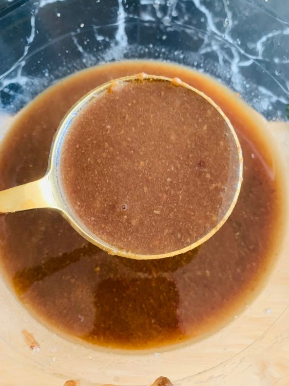 Step 1.1: Strain the mixture using a fine-mesh sieve, pressing the pulp to extract as much liquid as possible