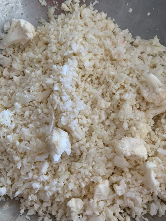 Step 1.1: Wash, pat dry and grate the cauliflower and set aside