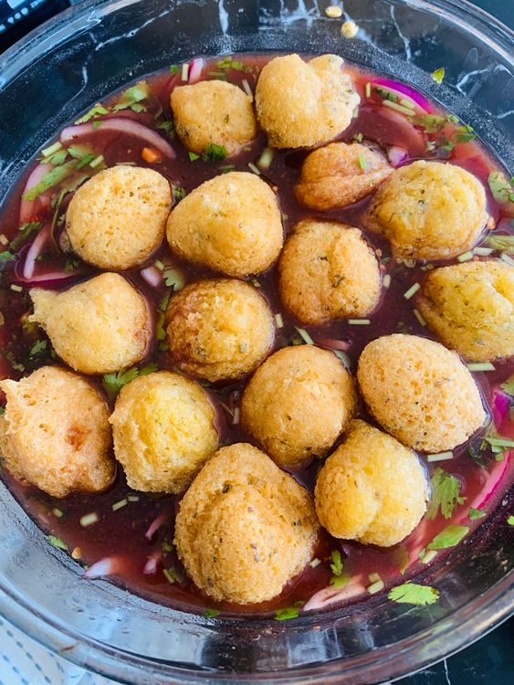 Step 4.1: Soak the fried ladoos in the prepared tamarind water for 15-20 minutes