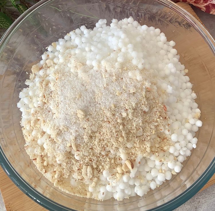 Step 1.1: Place the sabudana in a bowl, add sugar, ½ tsp salt and peanut powder