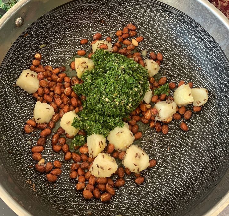 Step 3.1: Stir in the coriander and mint paste and saute for a minute