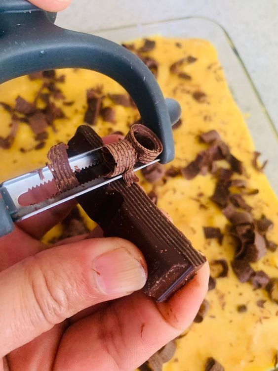 Step 4.1: Use a vegetable peeler or grater to shave the chocolate bar