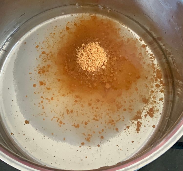 Step 1.1: In a deep pot, combine 1 cup water, sugar and jaggery