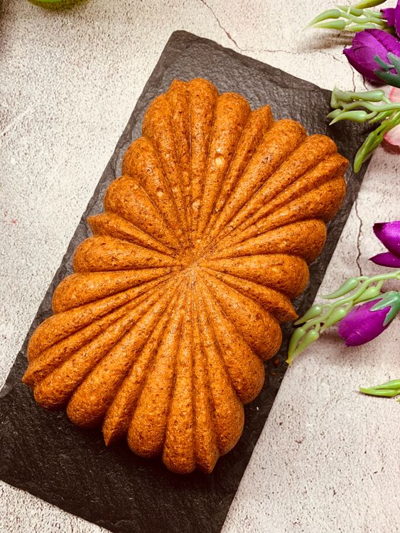 Step 1.1: Allow the cake to cool down completely, and then invert and remove the butter paper and thandai cake is ready!
