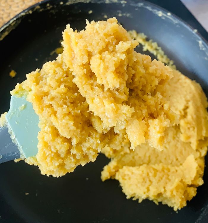 Step 1.2: Pour the condensed milk into the pan, stir and cook the mixture over low-medium heat, stirring continuously until the mixture thickens to a dough-like consistency