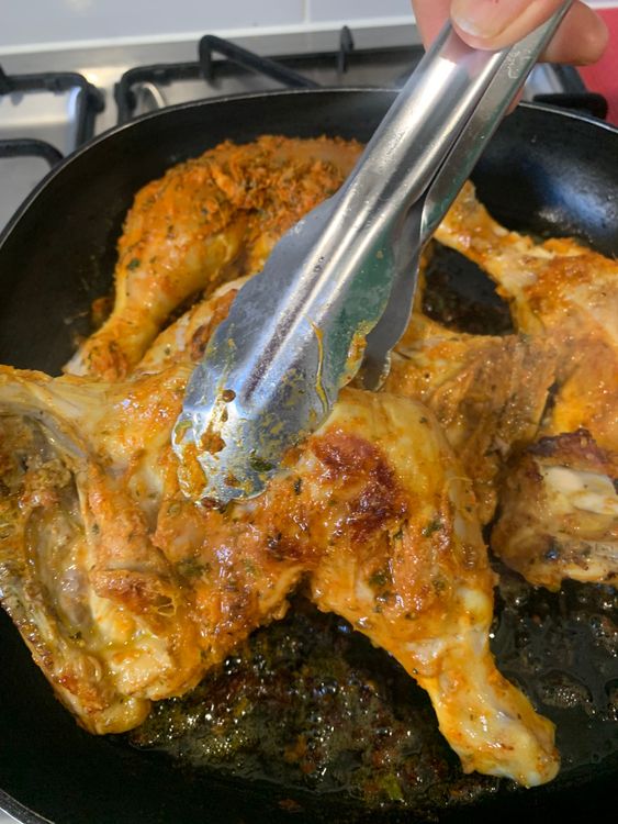 Step 1.1: Place the chicken Marylands in the skillet, skin-side down, along with lemon slices