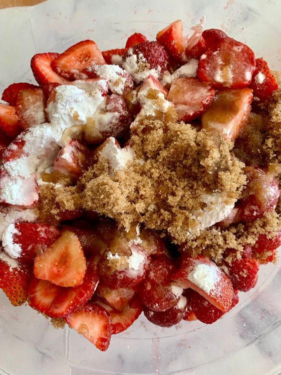 Step 2.1: In a large bowl, mix the strawberries with cornflour, brown sugar, lemon juice, and vanilla essence