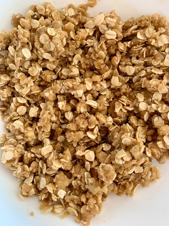 Step 1.1: Pour in melted butter and mix gently until the mixture forms a crumbly texture