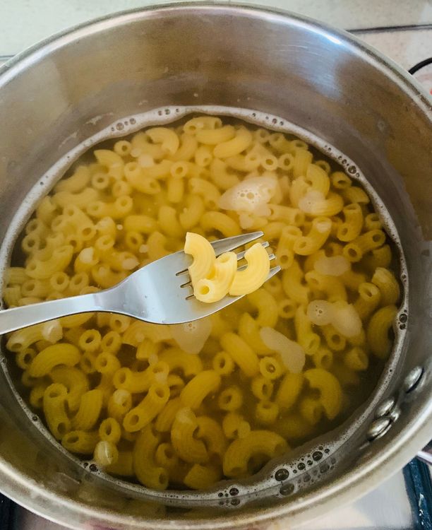 Step 2.1: In a large pot, bring water to a boil