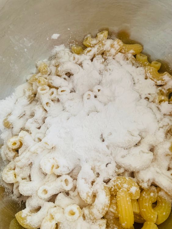 Step 2.1: Transfer the drained macaroni to a mixing bowl