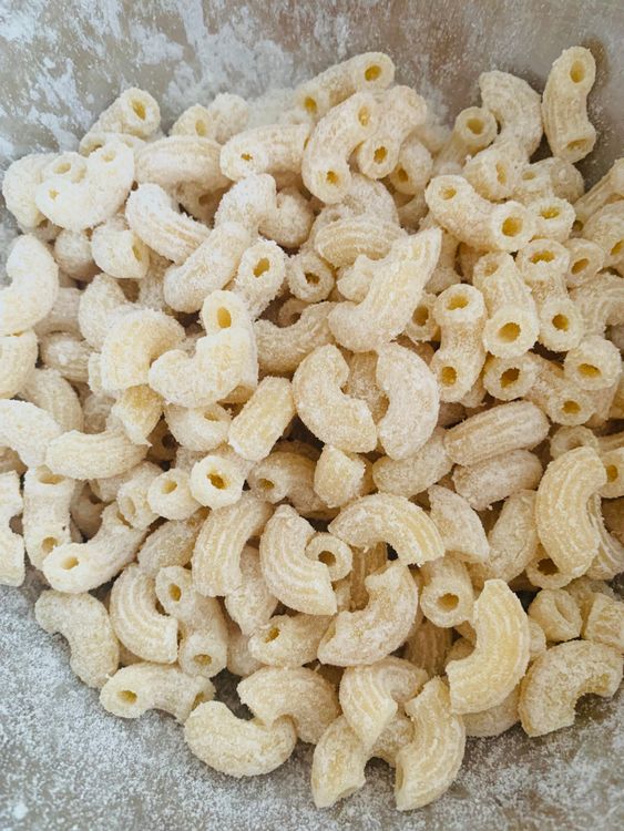 Step 2.2: Transfer the drained macaroni to a mixing bowl
