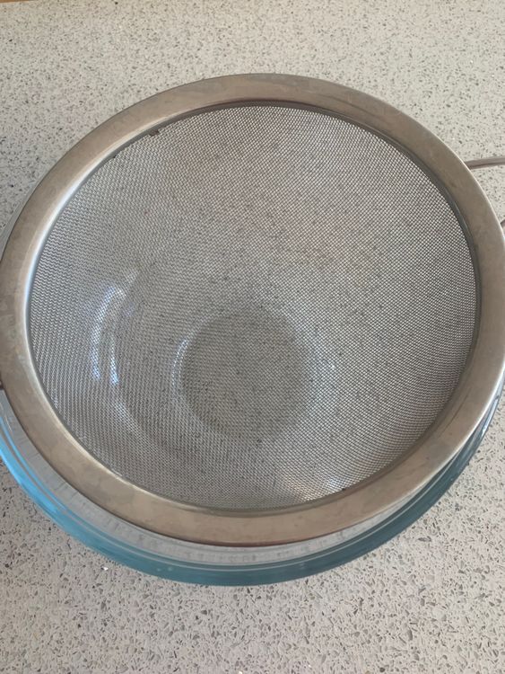 Step 1.1: Take a fine mesh strainer, place it over a deep bowl and cover it with a muslin/cheesecloth