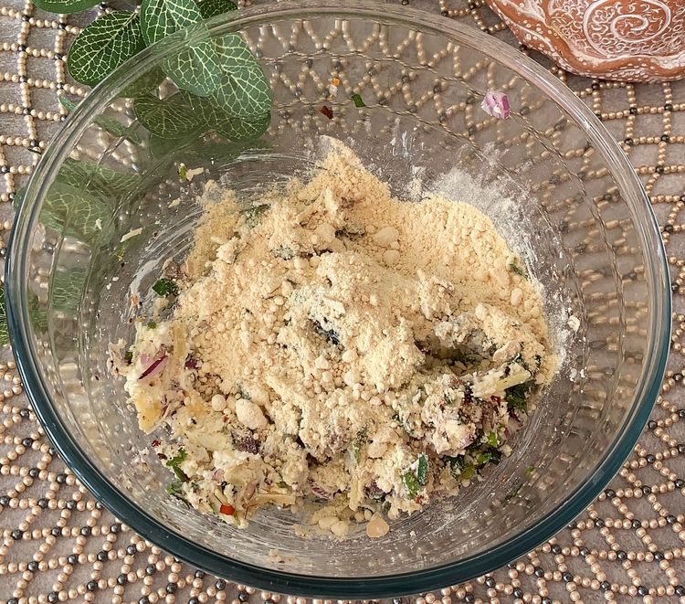 Step 1.2: Add grated paneer and cheese (if using), along with roasted gram flour