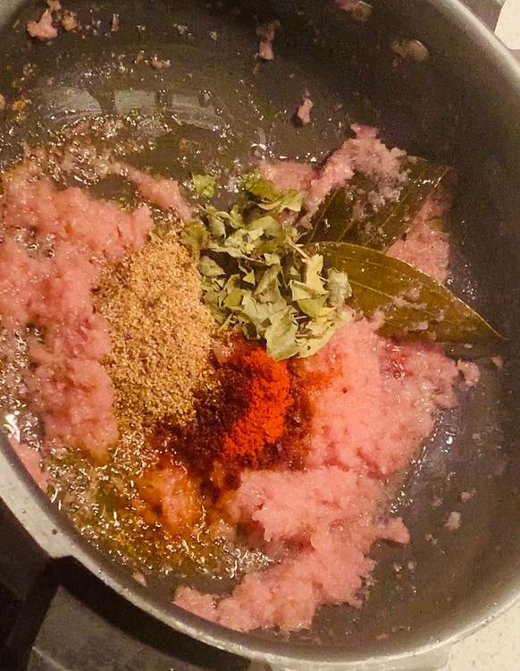 Step 2.1: Add kashmiri red chilli powder, the prepared spice powder, and dried curry leaves