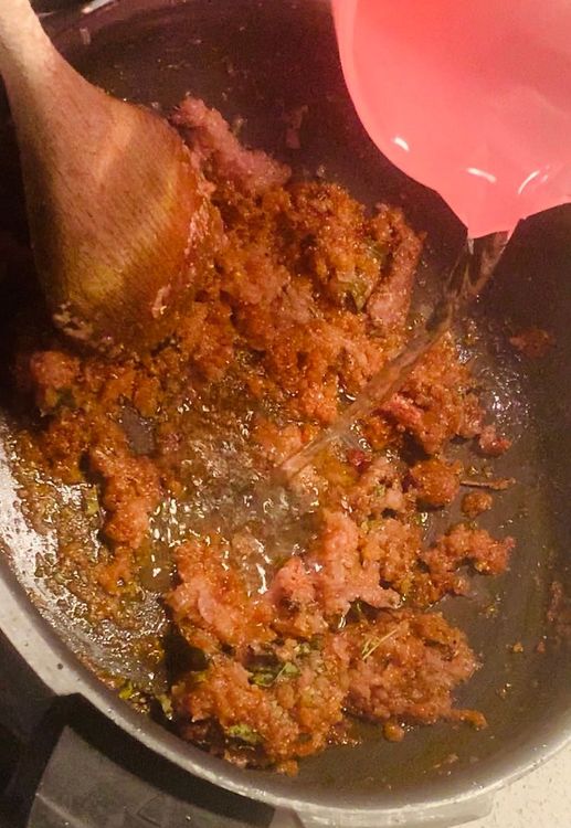 Step 2.2: Add kashmiri red chilli powder, the prepared spice powder, and dried curry leaves