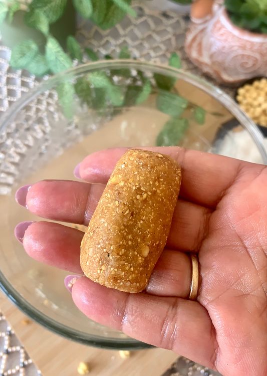 Step 1.1: Apply a light coat of oil to your hands and shape small portions of the dough into bite-sized balls
