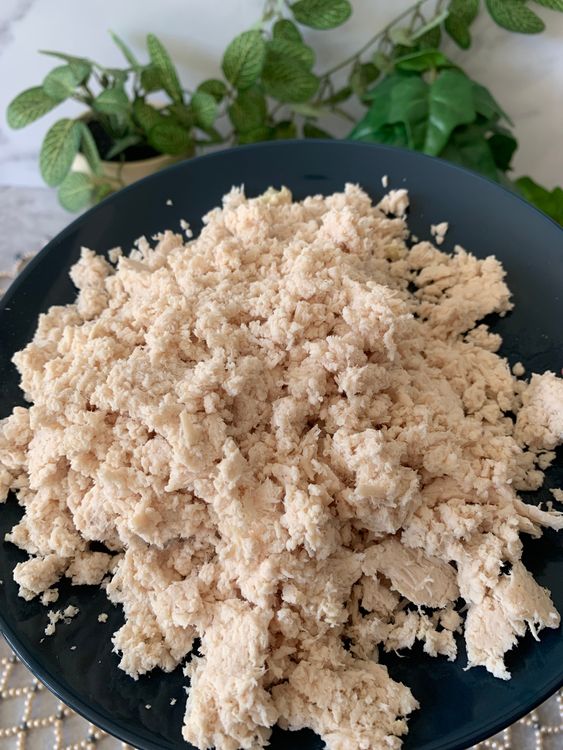 Step 1.2: Cook the chicken breast by boiling it and then finely blend it in a blender